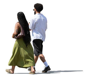 dark haired couple walking