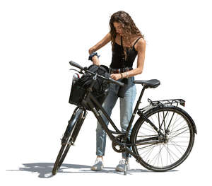 woman with a bike taking smth from her bag