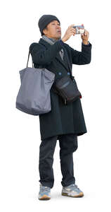 asian man taking a photo