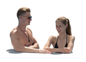 two people relaxing in the pool
