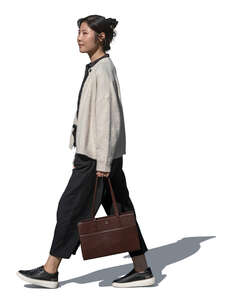 korean woman walking in side view