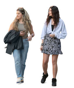 two cut out young women walking casually