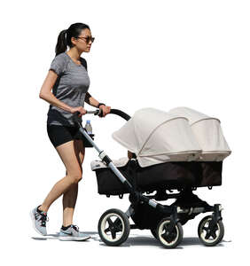 woman with twin carriage walking