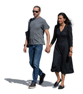 man and woman walking hand in hand