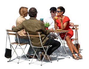 four adult friends sitting in a cafe