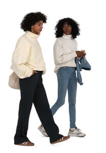 two women walking and talking