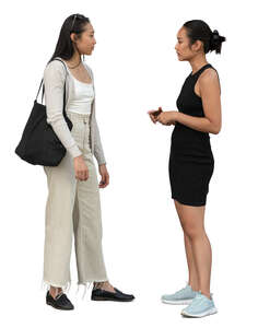 two cut out young asian women standing and talking
