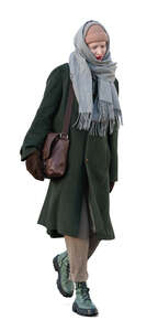 cut out young bohemian woman in winter walking