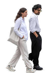 profile view of dark haired man and woman walking 
