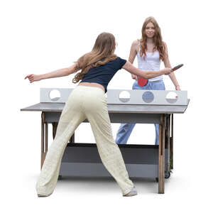 two teenage girls playing table tennis