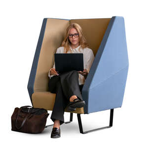 woman with a laptop sitting in an office armchair
