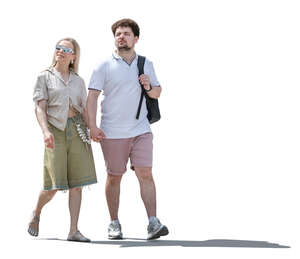 backlit couple walking and looking around