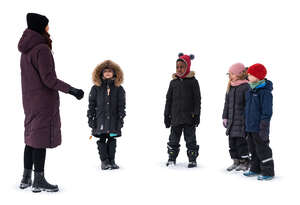 group of children in the winter listening to their teacher
