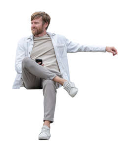 man sitting casually on a bench