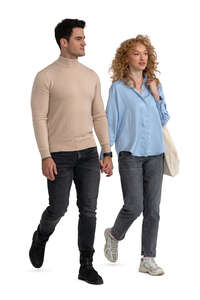 two people walking holding hands