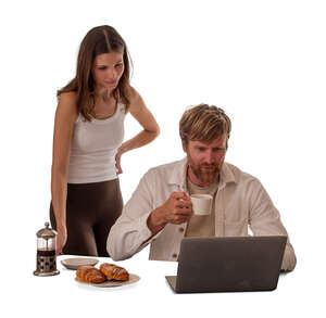 couple at home eating breakfast