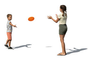 two kids playing frisbee