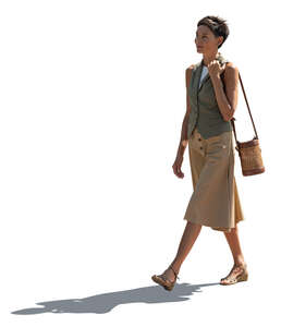 cut out backlit feminine woman walking