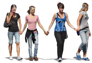 four girls walking hand in hand