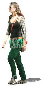 woman walking in a tree shade