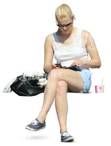 woman in shorts sitting