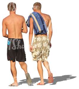 two men in shorts walking in the beach