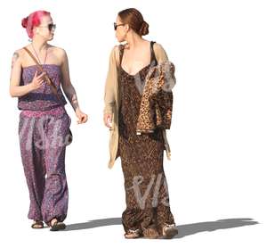 two women in summer dresses walking and talking