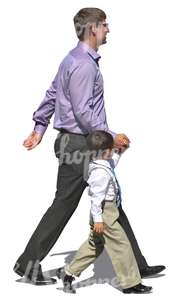 father and son in formal clothes walking