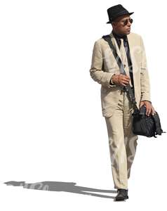 black man in a white suit and a hat