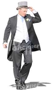 man in a tuxedo walking 