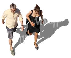 man and woman walking seen from above