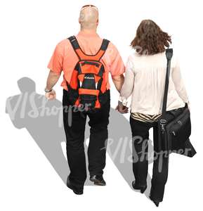 man and woman walking hand in hand