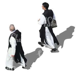 two monks walking seen from above