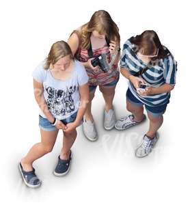 three teenage girls standing