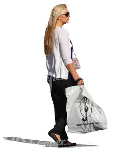 blond woman standing with a huge shopping bag