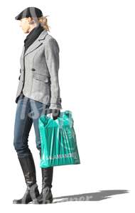 woman standing with a bag in her hand