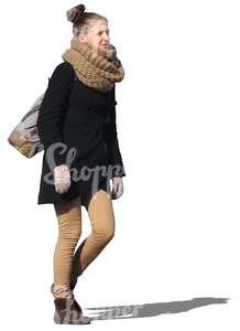 woman with a big scarf walking