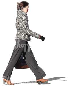businesswoman walking on the street in autumn