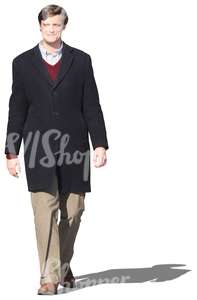 man in a black coat walking