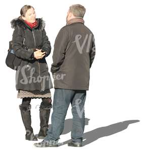 man and woman  talking in wintertime