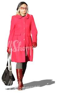 woman in a red coat walking