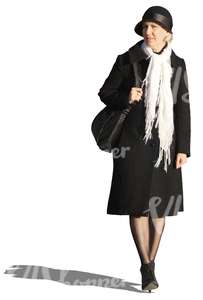 woman with a white scarf walking