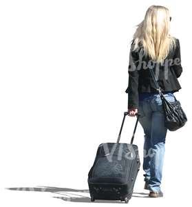 blond woman travelling with a suitcase