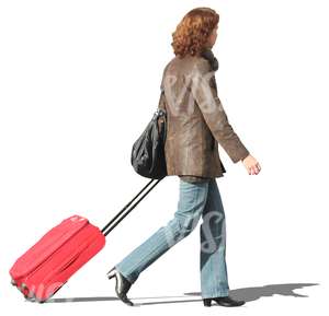 woman walking with a red suitcase