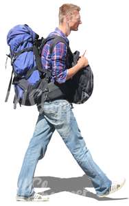 man carrying two bags walking
