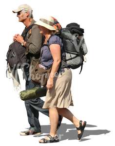 man and woman carrying heavey backpacks