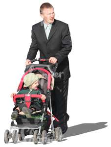 man in a suit pushing a baby stroller