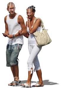 cut out couple in white walking arm in arm