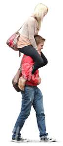 man carrying a woman on his shoulders