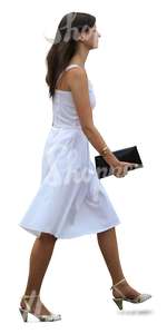 cut out woman in a fancy white dress walking